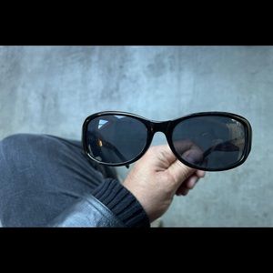 Black in black sunglasses